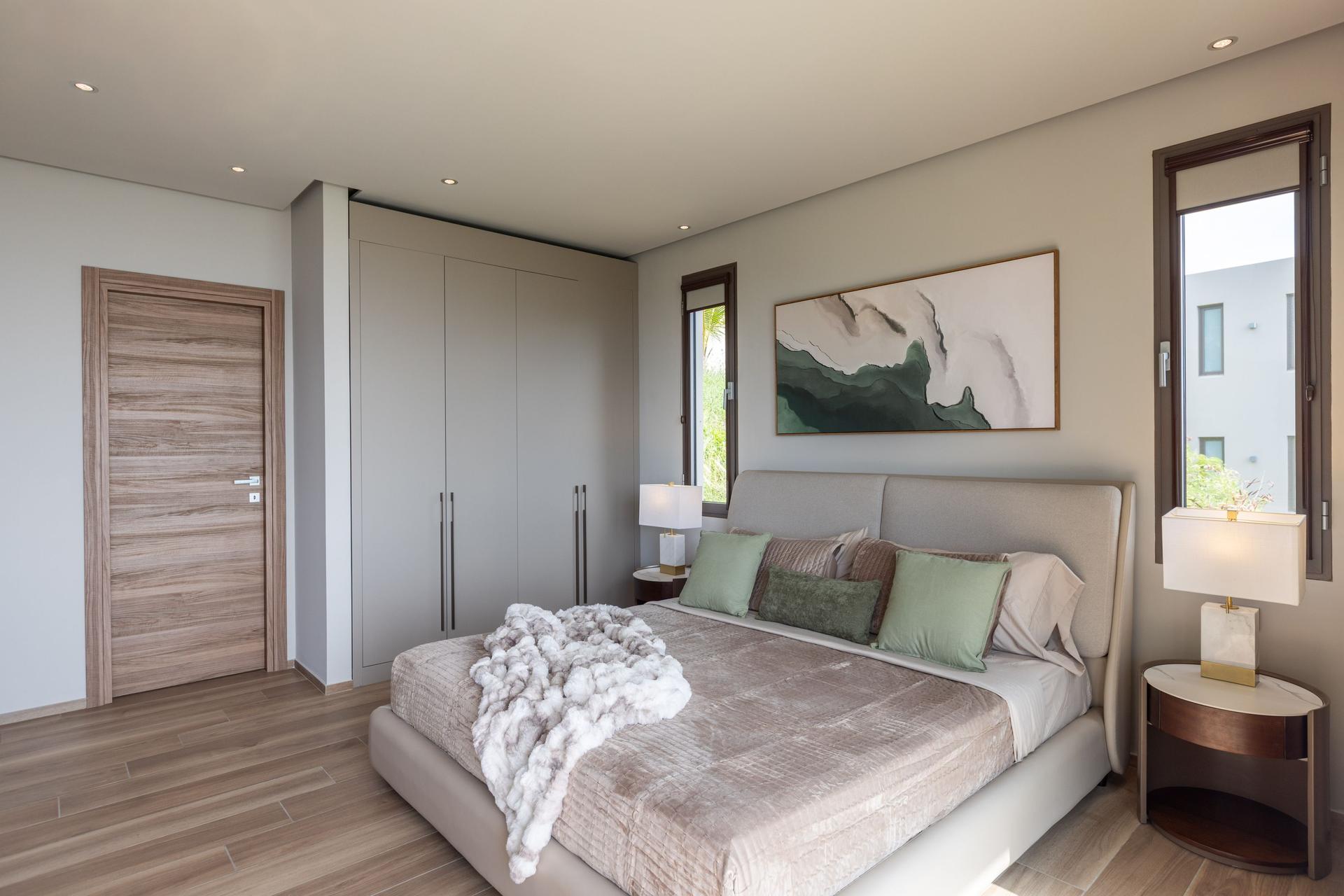 Contemporary Ocean‑View Apartment with Marble‑Veined Waterfall Island & Panoramic Glass Terrace